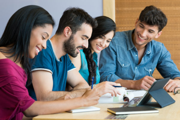 Happy student studying together